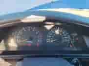 2000 Toyota Tacoma PreRunner z VIN 5TESN92N5YZ687107, wystawiony jako Copart lot #86193115 z przebiegiem 307 052 mil mil oraz Szkoda całkowita • Salvage title. Historia ofert i sprzedaży dostępna na DreamBid. Obrazek 9.