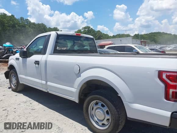 2019 Ford F-150 XL with VIN 1FTMF1CB1KKF30102, listed as a IAAI auction lot 42732812 with 103,711 mi miles and . Bid and sale history available at DreamBid. Image 14.