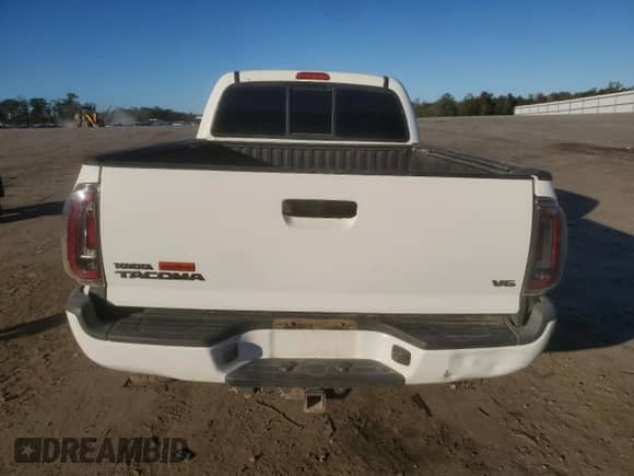 2013 Toyota Tacoma z VIN 3TMMU4FN8DM061180, wystawiony jako Copart lot #86698365 z przebiegiem 160 672 mil mil oraz Szkoda całkowita • Salvage title. Historia ofert i sprzedaży dostępna na DreamBid. Obrazek 6.