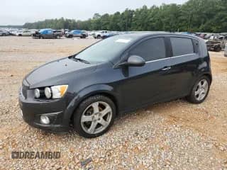 2015 Chevrolet Sonic LTZ with VIN 1G1JE6SBXF4207609, listed as a Copart auction lot 67843195 with 138,970 mi miles and Salvage title. Bid and sale history available at DreamBid. Image 1.