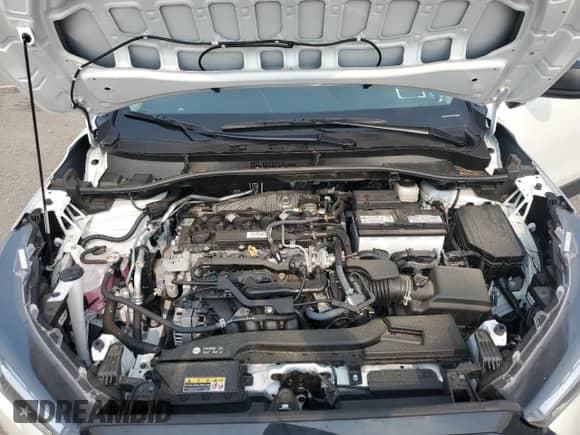 2024 Toyota Corolla Cross L with VIN 7MUAAABGXRV112077, listed as a Copart auction lot 67723795 with 13,365 mi miles and Salvage title. Bid and sale history available at DreamBid. Image 12.