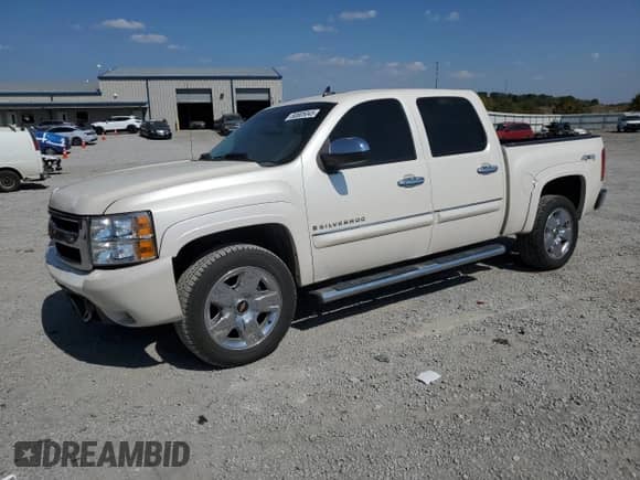 2009 Chevrolet Silverado 1500 LTZ with VIN 3GCEK33M69G249203, listed as a Copart auction lot 80805045 with 156,964 mi miles and Salvage title. Bid and sale history available at DreamBid. Image 1.