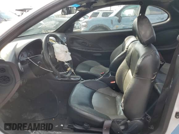 2000 Hyundai Tiburon с VIN KMHJG35F9YU191917, выставлен на аукционе Copart как лот 79629394 с пробегом 179 948 миль миль и Списание • Salvage title. История ставок и продаж доступна на DreamBid. Изображение 7.