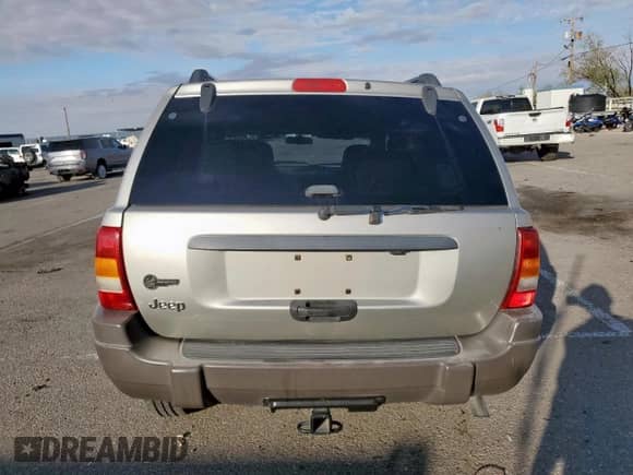2004 Jeep Grand Cherokee Laredo with VIN 1J4GX48S94C313442, listed as a Copart auction lot 86679925 with 52,727 mi miles and Salvage title. Bid and sale history available at DreamBid. Image 6.
