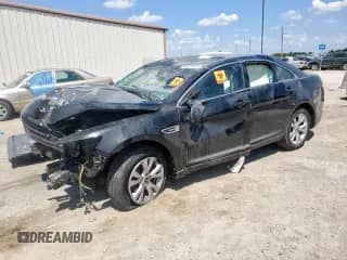 2010 Ford Taurus SEL with VIN 1FAHP2EW9AG128727, listed as a Copart auction lot 69129675 with Not provided miles and Salvage title. Bid and sale history available at DreamBid. Image 1.