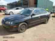 2005 Hyundai Elantra GLS z VIN KMHDN46D45U021031, wystawiony jako Copart lot #70877694 z przebiegiem 184 824 mil mil oraz Szkoda całkowita • Salvage title. Historia ofert i sprzedaży dostępna na DreamBid. Obrazek 1.