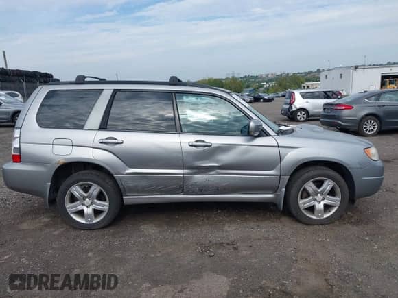 2008 Subaru Forester XT Limited z VIN JF1SG69698H709897, wystawiony jako IAAI lot #43328426 z przebiegiem 202 704 mil mil oraz . Historia ofert i sprzedaży dostępna na DreamBid. Obrazek 13.
