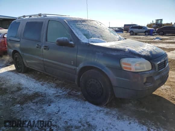 2005 Saturn Relay 2 with VIN 5GZDV03L25D239587, listed as a Copart auction lot 87667665 with 195,711 mi miles and Salvage title. Bid and sale history available at DreamBid. Image 4.