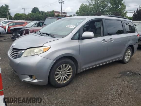 2012 Toyota Sienna XLE AAS with VIN 5TDYK3DC1CS273369, listed as a Copart auction lot 62348025 with Not provided miles and Clean title. Bid and sale history available at DreamBid. Image 1.