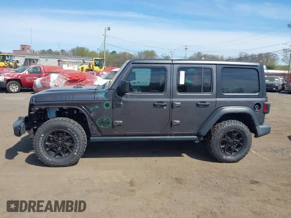 2021 Jeep Wrangler Unlimited Willys with VIN 1C4HJXDG1MW672507, listed as a IAAI auction lot 42084805 with 59,943 mi miles and . Bid and sale history available at DreamBid. Image 14.