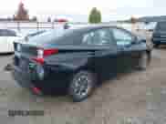 2022 Toyota Prius LE with VIN JTDKAMFU3N3187036, listed as a IAAI auction lot 43493399 with 98,731 mi miles and . Bid and sale history available at DreamBid. Image 4.