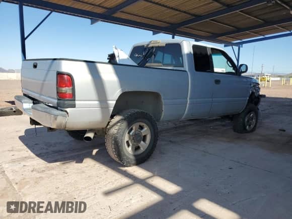 1999 Dodge 2500 with VIN 1B7KF2364XJ648660, listed as a Copart auction lot 69264725 with 167,545 mi miles and Salvage title. Bid and sale history available at DreamBid. Image 3.