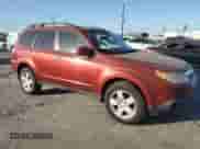 2009 Subaru Forester X with VIN JF2SH63679H738866, listed as a Copart auction lot 71632075 with 204,850 mi miles and Salvage title. Bid and sale history available at DreamBid. Image 4.