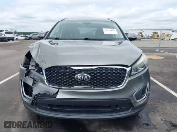 2016 Kia Sorento LX z VIN 5XYPG4A32GG127234, wystawiony jako IAAI lot #43027197 z przebiegiem 92 328 mil mil oraz . Historia ofert i sprzedaży dostępna na DreamBid. Obrazek 12.