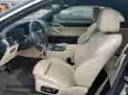 2022 BMW 4 Series 430i xDrive z VIN WBA43AT01NCJ15123, wystawiony jako Copart lot #49041984 z przebiegiem 14 296 mil mil oraz Szkoda całkowita • Salvage title. Historia ofert i sprzedaży dostępna na DreamBid. Obrazek 7.