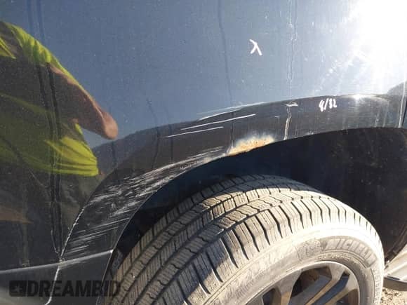 2007 Chevrolet Tahoe LTZ with VIN 1GNFK13027R249676, listed as a IAAI auction lot 43424132 with 296,751 mi miles and . Bid and sale history available at DreamBid. Image 16.