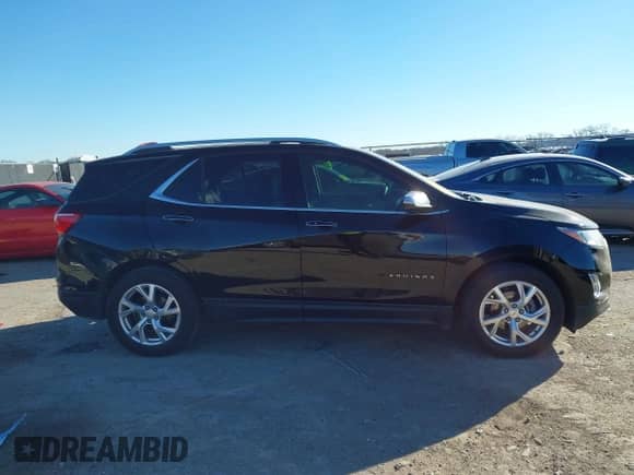 2020 Chevrolet Equinox Premier with VIN 2GNAXNEV1L6111029, listed as a IAAI auction lot 41250058 with 49,850 mi miles and . Bid and sale history available at DreamBid. Image 13.