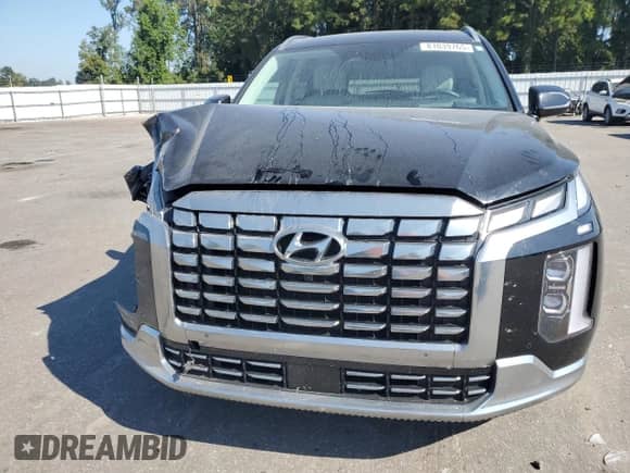 2023 Hyundai Palisade Calligraphy с VIN KM8R7DGE1PU553041, выставлен на аукционе Copart как лот 81039765 с пробегом 59 482 миль миль и Списание • Salvage title. История ставок и продаж доступна на DreamBid. Изображение 5.