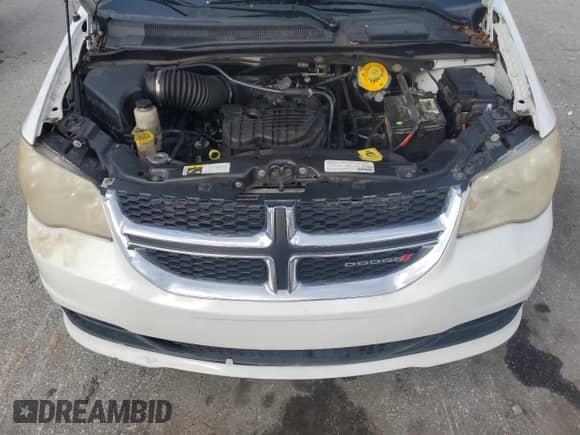 2014 Dodge Grand Caravan SXT z VIN 2C4RDGCG3ER155717, wystawiony jako Copart lot #85822865 z przebiegiem 158 656 mil mil oraz Czysty tytuł • Clean title. Historia ofert i sprzedaży dostępna na DreamBid. Obrazek 12.