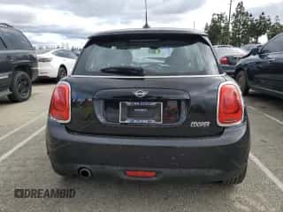 2019 MINI Hardtop Cooper with VIN WMWXP5C56K2H31697, listed as a Copart auction lot 48826655 with 60,190 mi miles and Salvage title. Bid and sale history available at DreamBid. Image 6.