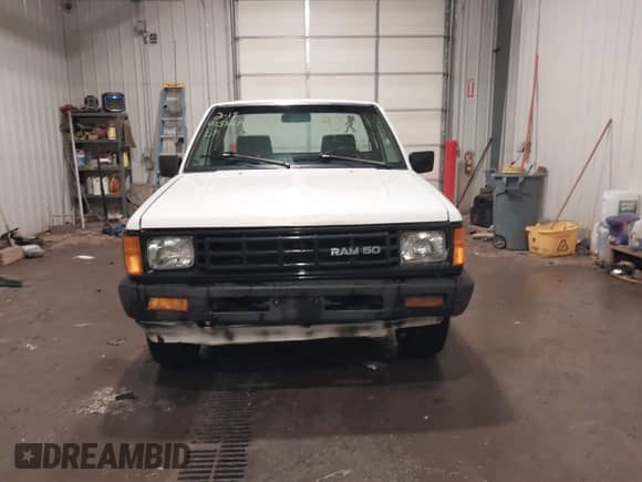 1992 Dodge RAM with VIN JB7FL24W7NP011183, listed as a IAAI auction lot 41586341 with 166,501 mi miles and . Bid and sale history available at DreamBid. Image 13.