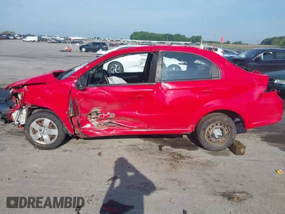 2009 Chevrolet Aveo 1LT z VIN KL1TD56E79B665441, wystawiony jako IAAI lot #42507588 z przebiegiem 110 210 mil mil oraz . Historia ofert i sprzedaży dostępna na DreamBid. Obrazek 14.