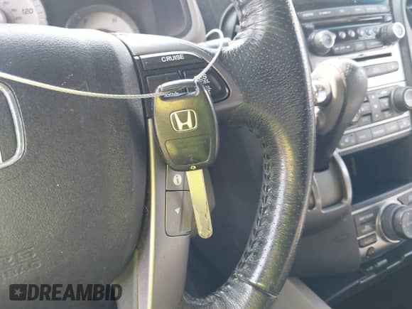 2012 Honda Pilot Touring with VIN 5FNYF4H93CB044933, listed as a IAAI auction lot 43249328 with 218,196 mi miles and . Bid and sale history available at DreamBid. Image 11.