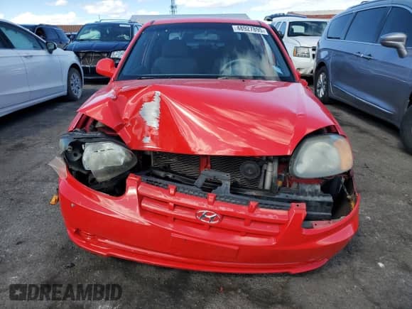 2005 Hyundai Accent GLS с VIN KMHCG35C85U333815, выставлен на аукционе Copart как лот 48927895 с пробегом 108 933 миль миль и Списание • Salvage title. История ставок и продаж доступна на DreamBid. Изображение 5.
