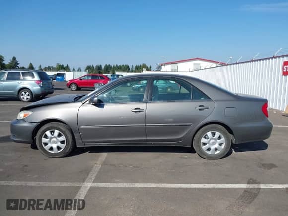 2003 Toyota Camry XLE with VIN 4T1BE32K33U719780, listed as a IAAI auction lot 43107094 with 144,249 mi miles and . Bid and sale history available at DreamBid. Image 14.