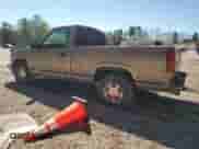 1997 Chevrolet Silverado 1500 with VIN 1GCEC14R4VZ211975, listed as a Copart auction lot 50190115 with 132,978 mi miles and Salvage title. Bid and sale history available at DreamBid. Image 2.