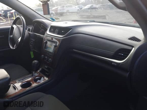2014 Chevrolet Traverse LT z VIN 1GNKVGKD1EJ138478, wystawiony jako IAAI lot #41213709 z przebiegiem 47 970 mil mil oraz . Historia ofert i sprzedaży dostępna na DreamBid. Obrazek 5.
