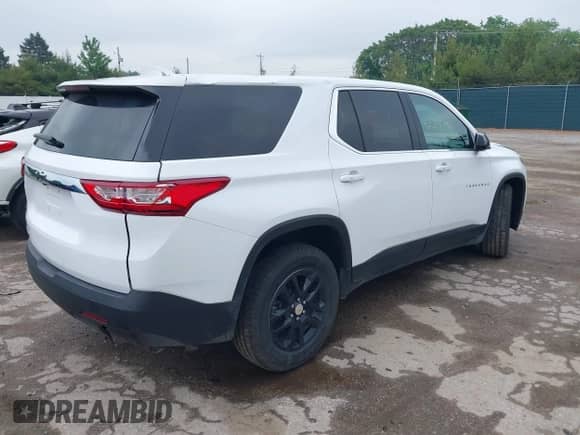 2020 Chevrolet Traverse LS z VIN 1GNEVFKW5LJ111080, wystawiony jako IAAI lot #42385990 z przebiegiem 100 510 mil mil oraz . Historia ofert i sprzedaży dostępna na DreamBid. Obrazek 4.