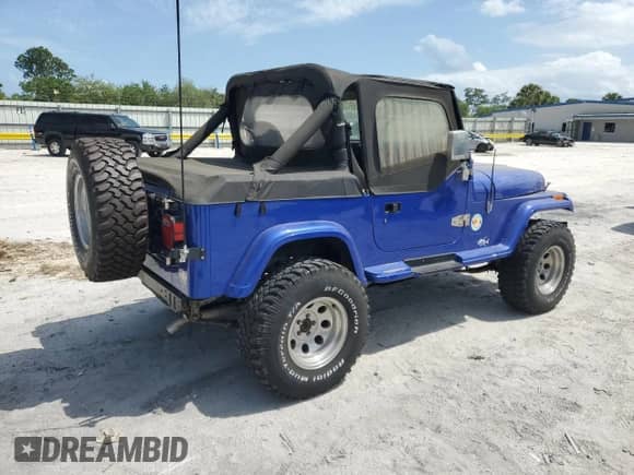 1990 Jeep Wrangler z VIN 2J4FY39T8LJ519849, wystawiony jako Copart lot #50917265 z przebiegiem 153 966 mil mil oraz Czysty tytuł • Clean title. Historia ofert i sprzedaży dostępna na DreamBid. Obrazek 3.