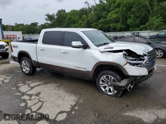 2020 Ram 1500 Longhorn with VIN 1C6SRFKTXLN136868, listed as a Copart auction lot 60429505 with 52,310 mi miles and Salvage title. Bid and sale history available at DreamBid. Image 4.