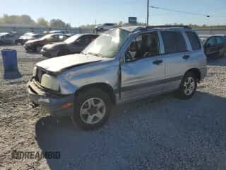 2003 Chevrolet Tracker with VIN 2CNBE13C636908563, listed as a Copart auction lot 76871754 with 205,684 mi miles and Salvage title. Bid and sale history available at DreamBid. Image 1.