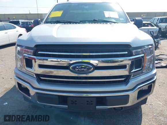 2018 Ford F-150 XLT z VIN 1FTEW1EG4JKD73029, wystawiony jako IAAI lot #43200359 z przebiegiem 72 883 mil mil oraz . Historia ofert i sprzedaży dostępna na DreamBid. Obrazek 11.