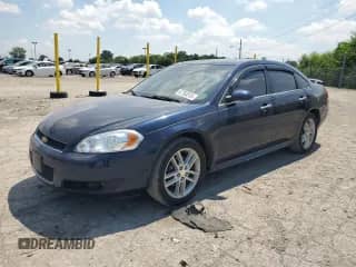 2012 Chevrolet Impala LTZ with VIN 2G1WC5E32C1213194, listed as a Copart auction lot 67763315 with 106,856 mi miles and Salvage title. Bid and sale history available at DreamBid. Image 1.