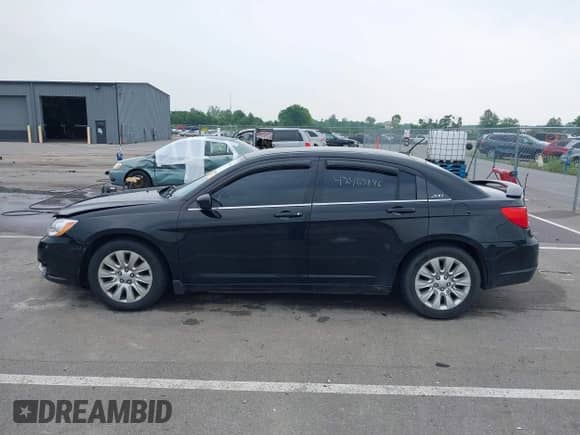 2014 Chrysler 200 LX with VIN 1C3CCBAG5EN157680, listed as a IAAI auction lot 42463846 with 166,482 mi miles and . Bid and sale history available at DreamBid. Image 14.