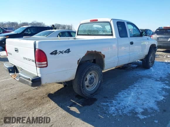 2003 Dodge Dakota с VIN 1D7HG12X43S345125, выставлен на аукционе IAAI как лот 41327861 с пробегом 312 385 миль миль и . История ставок и продаж доступна на DreamBid. Изображение 4.