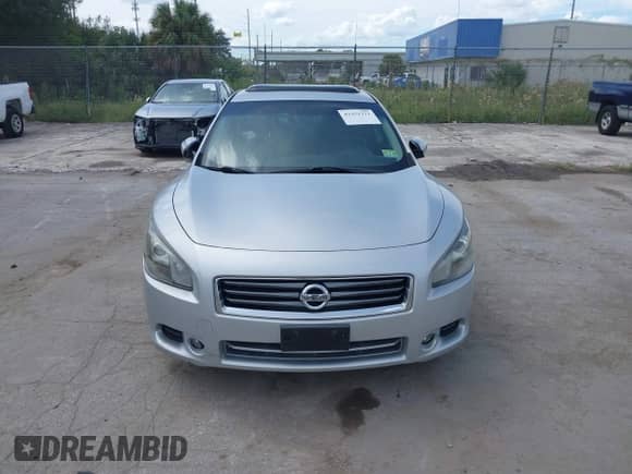 2014 Nissan Maxima S z VIN 1N4AA5APXEC444170, wystawiony jako IAAI lot #43251311 z przebiegiem 243 605 mil mil oraz . Historia ofert i sprzedaży dostępna na DreamBid. Obrazek 12.