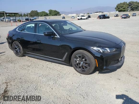 2025 BMW i4 eDrive40 с VIN WBY23HD04SFU02854, выставлен на аукционе Copart как лот 68536175 с пробегом 3 720 миль миль и Списание • Salvage title. История ставок и продаж доступна на DreamBid. Изображение 4.