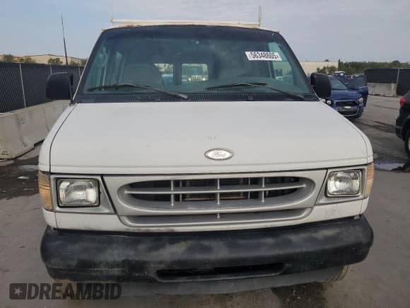 2002 Ford Econoline Cargo с VIN 1FTNE24L82HB20009, выставлен на аукционе Copart как лот 56348605 с пробегом 150 630 миль миль и Чистый • Clean title. История ставок и продаж доступна на DreamBid. Изображение 5.
