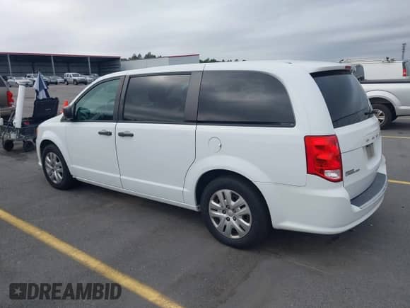 2019 Dodge Grand Caravan SE with VIN 2C4RDGBG8KR638293, listed as a IAAI auction lot 43290326 with 92,178 mi miles and . Bid and sale history available at DreamBid. Image 3.