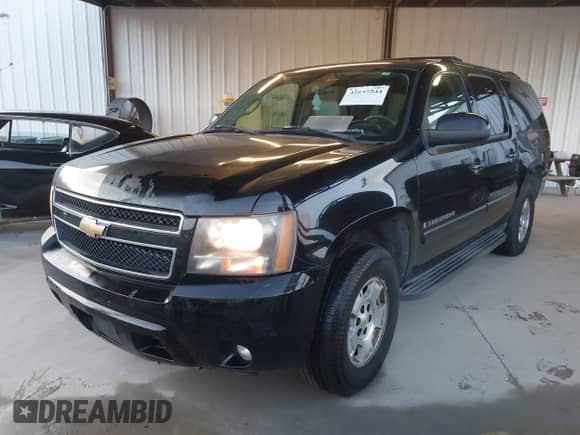 2007 Chevrolet Suburban LT z VIN 3GNFC16057G146602, wystawiony jako IAAI lot #42847544 z przebiegiem 310 218 mil mil oraz . Historia ofert i sprzedaży dostępna na DreamBid. Obrazek 2.