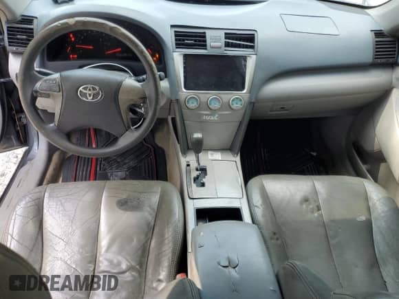 2009 Toyota Camry LE z VIN 4T1BE46K29U296523, wystawiony jako Copart lot #80359865 z przebiegiem 190 864 mil mil oraz Czysty tytuł • Clean title. Historia ofert i sprzedaży dostępna na DreamBid. Obrazek 8.