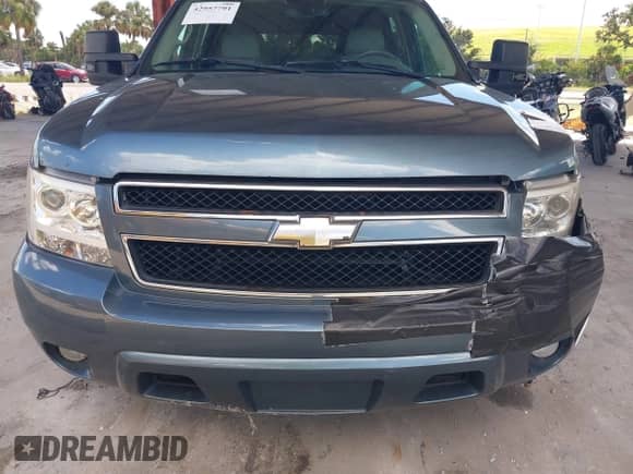 2008 Chevrolet Suburban LTZ with VIN 3GNFC16058G223941, listed as a IAAI auction lot 42957791 with 234,231 mi miles and . Bid and sale history available at DreamBid. Image 13.