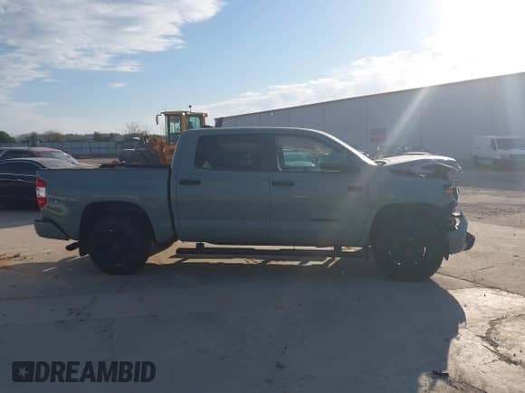 2021 Toyota Tundra SR5 with VIN 5TFDY5F14MX046533, listed as a IAAI auction lot 41663194 with 55,758 mi miles and . Bid and sale history available at DreamBid. Image 13.