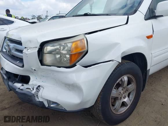 2006 Honda Pilot EX with VIN 2HKYF18416H532772, listed as a IAAI auction lot 43378789 with 168,317 mi miles and . Bid and sale history available at DreamBid. Image 12.