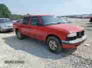 2001 Chevrolet S-10 LS with VIN 1GCDT13W71K258259, listed as a Copart auction lot 60201065 with 177,444 mi miles and Salvage title. Bid and sale history available at DreamBid. Image 4.