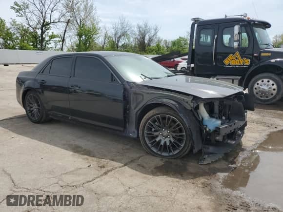 2013 Chrysler 300 C John Varvatos Limited Edition with VIN 2C3CCADT9DH672613, listed as a Copart auction lot 53876325 with 182,546 mi miles and Salvage title. Bid and sale history available at DreamBid. Image 4.